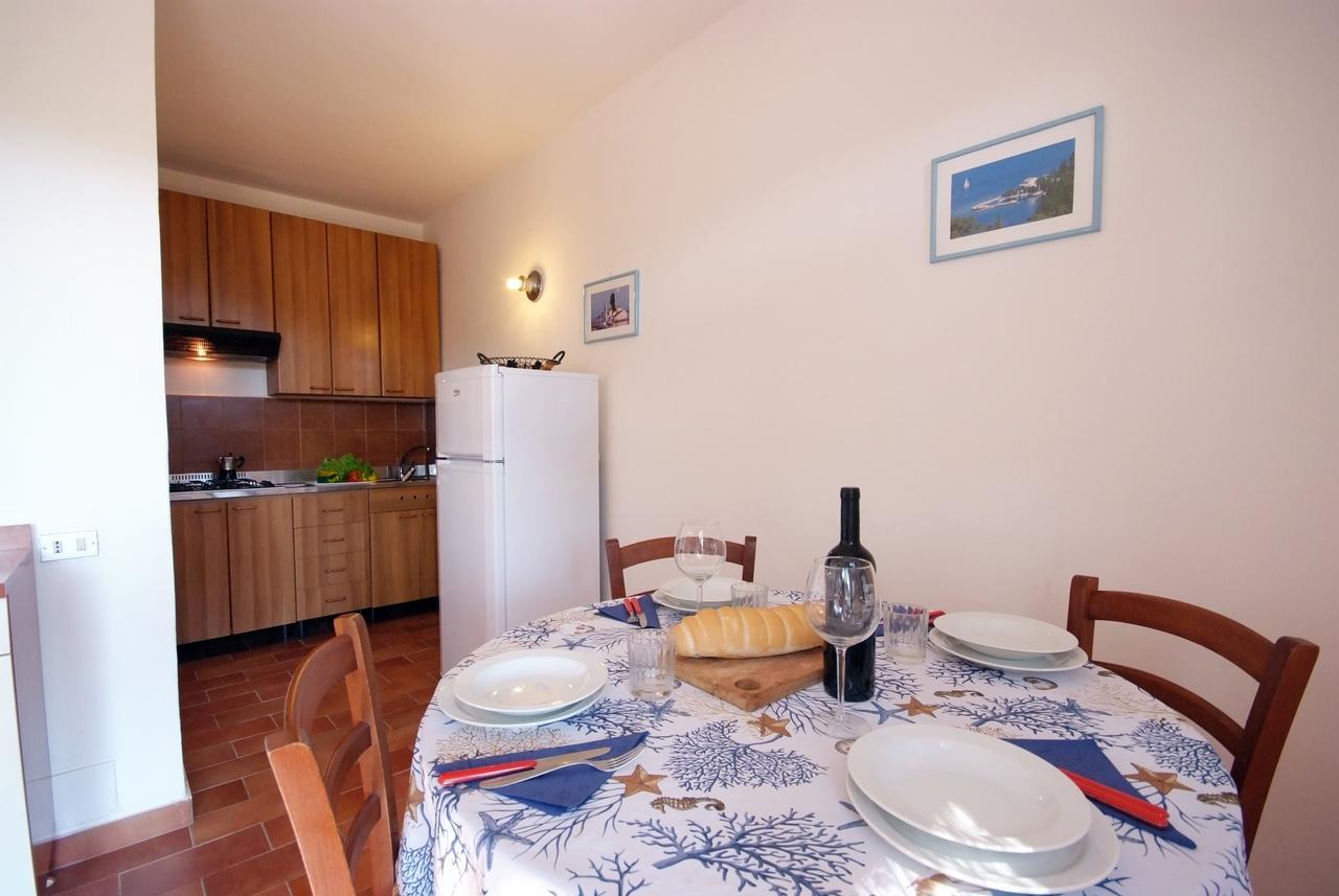 Residence Sud Est Porto Azzurro Exteriör bild